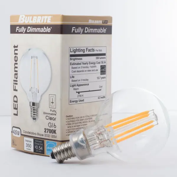 This G16 LED bulb combines classic filament aesthetics with modern efficiency, using just 4W to replace 40W incandescent bulbs. The warm 2700K light and clear finish create inviting ambiance while the 15,000-hour lifespan ensures years of reliable performance. - alternate view