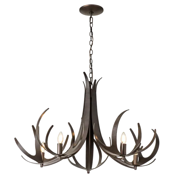 The Caribou 5-Light Chandelier is over 40" in diameter grabbing attention in any setting. Inspired by the classic antler chandelier, this stylized interpretation by our designers is created in the fires of our forges where we heat the steel elements until they are red-hot and then bend and shape them to create the 15 points that you see in this Caribou. Available in any of our standard interior finishes, or choose an RAL option for a pop of color for a modern twist! - alternate view