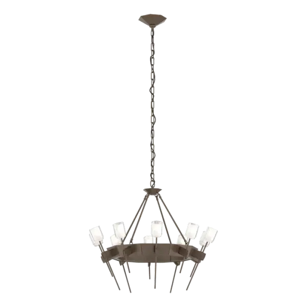 The Echo 10-Light Circular Chandelier combines both faceted and pure geometric forms, blending clean and gothic architectural elements. Rough, forged “hands” gently holding a delicate glass flower served as inspiration for the individual elements of this piece. Thick, frosted glass is perched on each delicate stem.