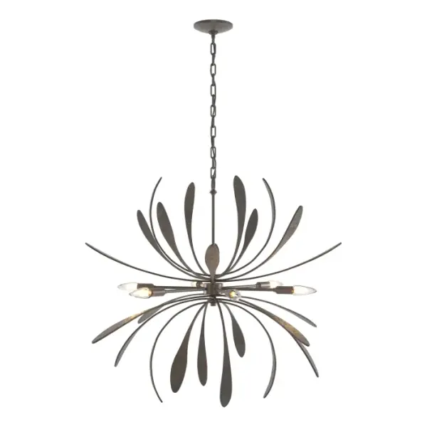 True to the beauty of its namesake flower, the Dahlia Chandelier provides a sculptural botanic aesthetic. Handcrafted forged steel “petals” flare outward from the center and are illuminated by 6 exposed bulbs. As versatile as it is stylish, the Dahlia Chandelier is available in your choice of finishes, making it the perfect pick for living room, dining or entryway lighting. Also available in a larger version.