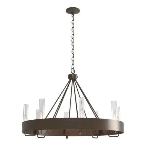 As at home in a modern lodge with exposed beams, as in a contemporary city loft, the Banded Ring Chandelier is far-reaching in its appeal. Clean lines radiate upward from a wide steel band, as candelabra bulbs warmly illuminate within 8 glass cylinders. Available in clear or opal glass options.