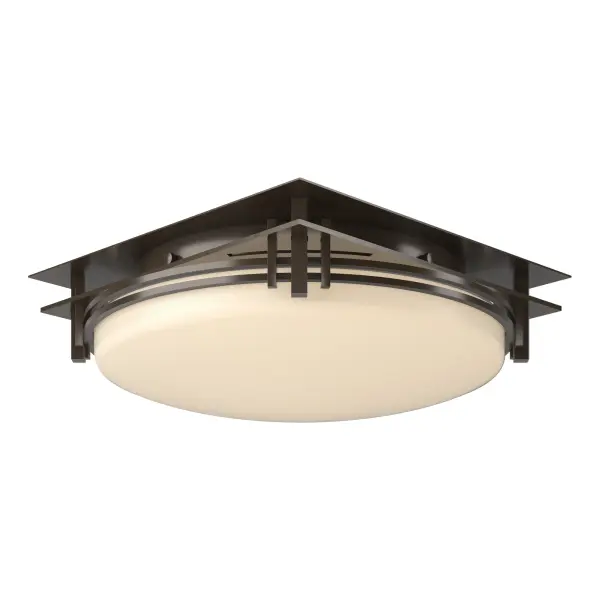 A clean, sleek design that evokes dreams of the Far East is the hallmark of this flush-mount ceiling light from our Banded Collection. True to the collection's name, a handcrafted steel band encircles the glass. Crafted here at our forge by Vermont artisans.