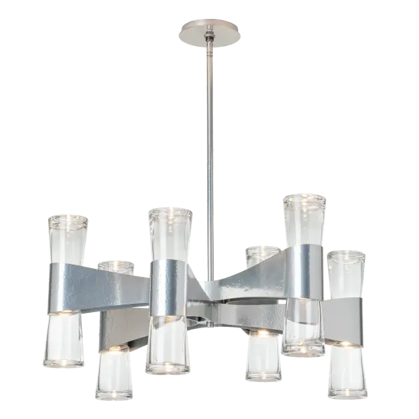 Looking for a chandelier with style to spare? The Bellis chandelier brings both up- and downlight to its space. This 12-light configuration is round, with its six arms made of heavily forged and textured steel seem with flow in ribbon-like movement. Each hand-forged arm holds a twin thick-bottomed, clear glass. Available in any of our standard interior finishes.