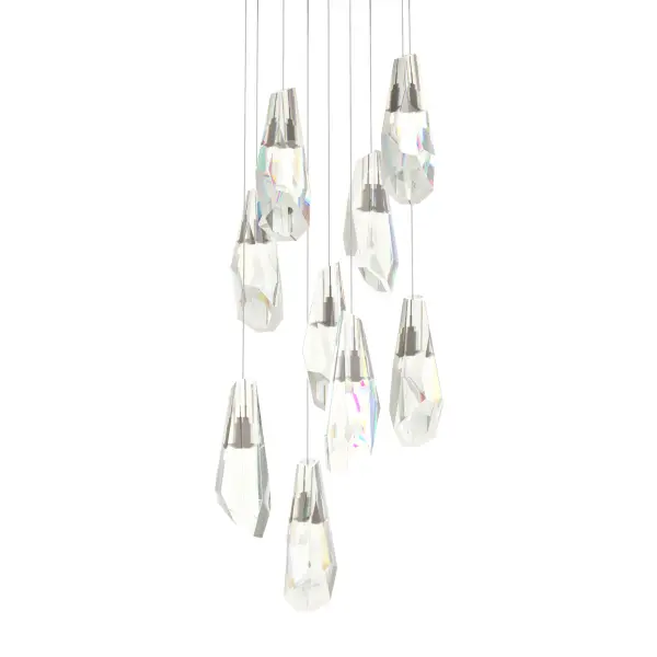Large hand-cut and polished crystal shades adorn this stunning multi-port chandelier. With 9 Luma crystals, this elegant piece offers the ability to customize the length of each to suit the space.