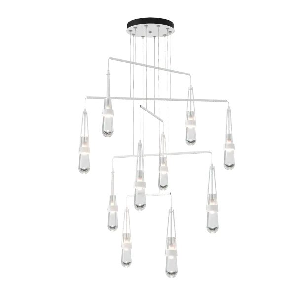 Love our Link Pendant but don't have the ceiling available to accommodate a larger canopy? Looking for the Link to occupy a larger area? Here is the solution. A mobile version, minimizing the canopy while providing a wider expanse gives the Link breadth with delicate metal tubes that guide the cables in a highly-adjustable balance of light. Ten thick, clear glass vessels are the trademark of this Link pendant.