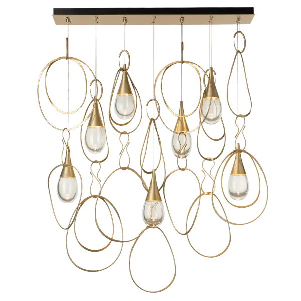 Stunning. The linear canopy sets the overall space; yet, the Lyric 7-Light Pendant is fully customizable in height and style. Sleekly-shaped inverted "cones" top the wonderful clear, thick bottom teardrop glass lit from within. Abstract oval rings are free-moving and can be positioned to suit the design of the space. Artistically created jewelry-like "hooks" serve as elegant connectors. Impressive, yet with a sense of whimsy, the Lyric will be the focal piece in any space. - alternate view