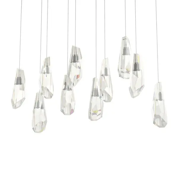 A linear multi-port fixture, the Luma 10-Light features two rows of large, stunning hand-cut and polished crystals that can be hung at the same level or staggered to suit the space. Customizable in length, as well, this graceful array of crystal-adorned lights creates a focal point in any room.