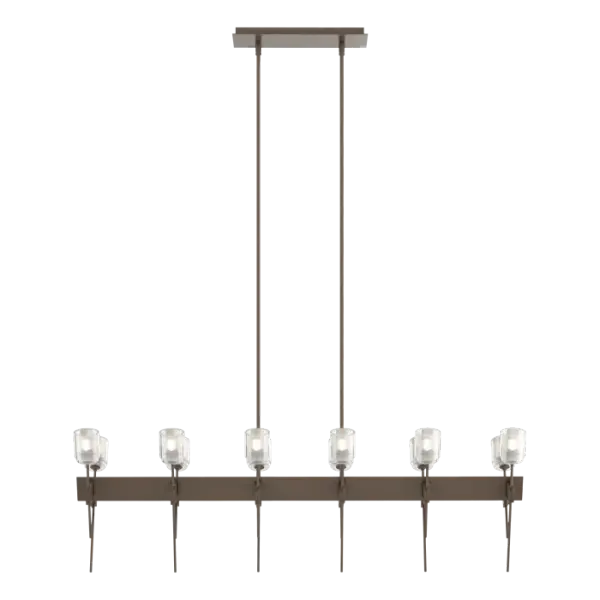 Rough, forged "hands" gently holding a delicate glass flower was the inspiration for the individual elements of the Echo 12-Light Linear Pendant. The look is echoed in this lighting fixture creating a harmonic blend of alternating lengths. The glass is thick and frosted, perched on a delicate stem.