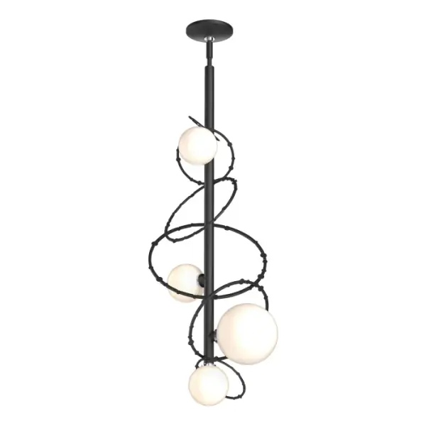 The Olympus Vertical Pendant is part of the 2021 Olympus Collection that includes a grand Orb pendant, wall sconce, two starburst pendants, and a vertical pendant, in addition to this Vertical Pendant. Featuring four glass globes and hand-forged steel rings on a vertical rod, the Olympus Vertical Pendant may be hung singly over a nightstand or vanity, or in multiples over a kitchen island, or any space that requires both light and visual movement.