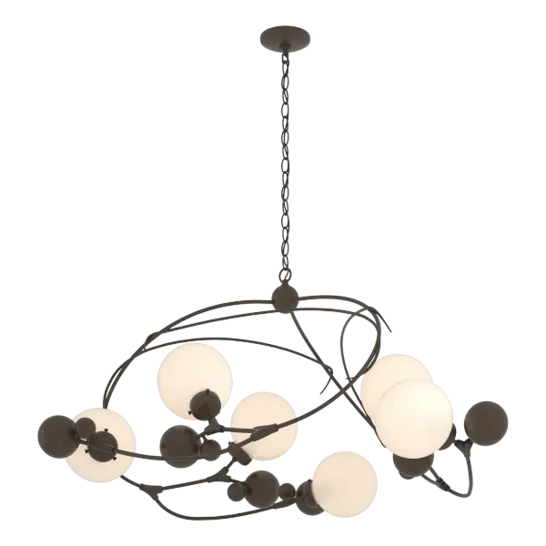 Due to popular demand, the large Sprig Circular Pendant joins the Sprig Collection in 2021. Perfect for a foyer, dining room or lounge area, the Sprig Circular Pendant's intertwined handmade steel "vines" carry "berries" made of steel and glass globes (available in opal, opaline or water glass options). The Sprig collection also includes asymmetric pendants, sconce, and large semi-flush.