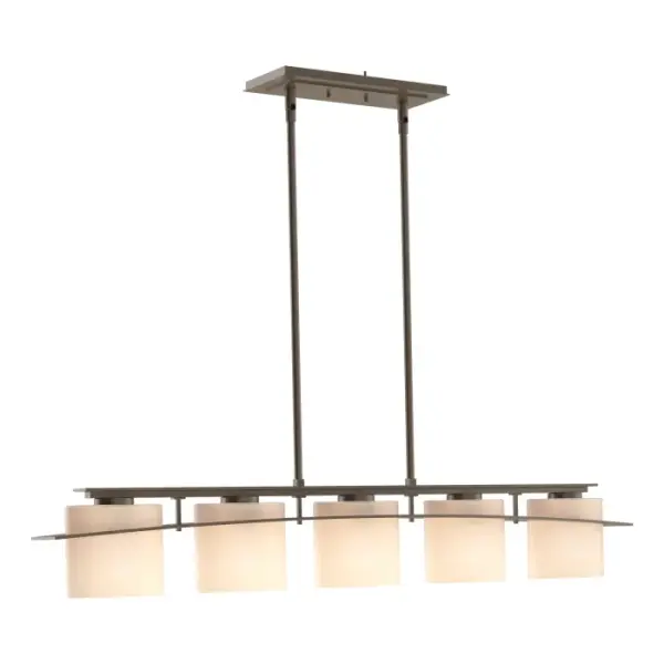 A horizontal steel bar connects tube to glass with each of the five glasses captured in a steel plate. The lines of the plate make it look as though metal has passed through glass rather than the other way around. Crafted by our artisans here in Vermont.