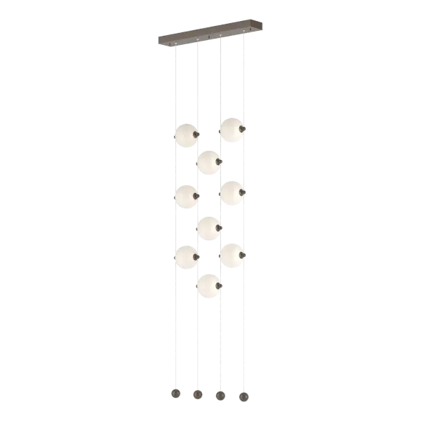 Looking for a room divider, or just a whimsical feature by a headboard or at the entryway? The Abacus 9-Light LED Pendant provides both light and experiential art. True to its namesake, the Abacus can be customized by moving any of the nine blown glass globes up or down its low-voltage cable "rail", by virtue of tiny grippers on each side that when squeezed, free the globe to slide and stop, exactly where you want to position it. Small steel balls anchor each cable.