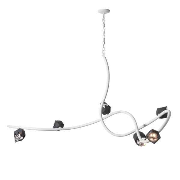 With its organic, sculptural feel, this contemporary “branch” that loops and flows seems to dance across a nearly 6-foot span in mid-air. Adorned with six hand-blown glass elements, each made of a thick, clear layer of glass that is encased in an outer cocoon of colored glass. The lower portion of the outer layer of glass is removed by painstakingly hand-polishing it, revealing its inner crystal clear, faceted glass to stunning effect.