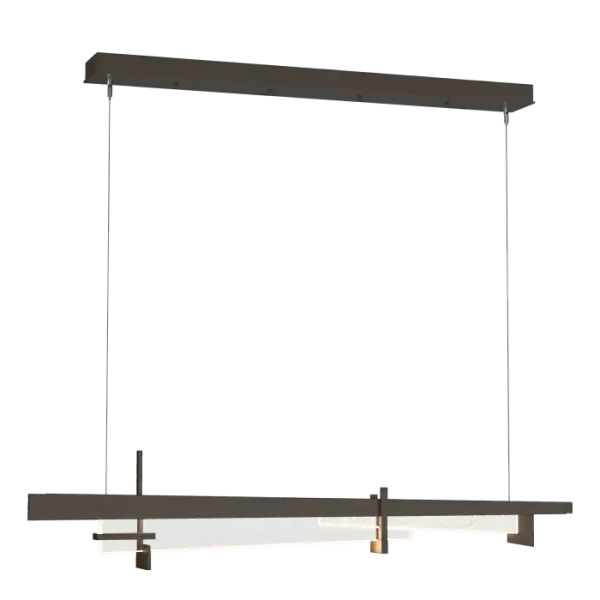 The Tenon Pendant brings together contemporary LED technology with a nod to the indelible design of the Arts and Crafts movement. Thick clear glass, clean steel lines and an element of seeded glass are hung from thin cables to form a streamlined and versatile pendant. - alternate view