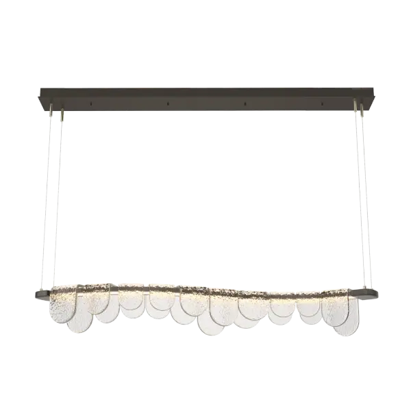 Inspired by the cold icy streams of Vermont that are adorned with ice covered rocks and frozen boulders, this riverbed of light with meandering artisan glass is stunning. Featuring a curved LED light-guide platform, the Riverbed Pendant’s unique, clear, textured poured glass has been formed and shaped like frozen stones along the river’s edge by our local partner, AO Glass, working with HF designer Andy Morter.