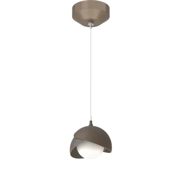 This simple but stylish, low voltage pendant is offered with the option of contrasting finish double shades. The Brooklyn Double Shade Mini Pendant features a single light suspended from a small round ceiling canopy. Available in all standard finishes.