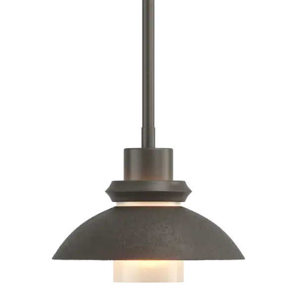Forged, textured steel coupled with the simple elegance of the glass puts high-quality craftsmanship on display. As a complement to the pendant that heads the Staccato Collection, or on its own, it will add sophistication to your space.