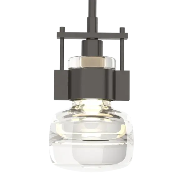 A heavy, steel cuff embraces and secures the stunning, thick blown-glass of this large Cuff Pendant. This is a "jumbo" version with a diameter of 7.5" to bring light and style to any room.