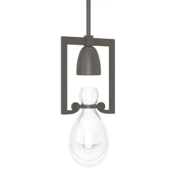 Pools of light trickle down and are captured within the Apothecary Mini Pendant's thick hand-blown hourglass vessel. Simplicity and detail for well-balanced style. Part of the New Traditional Collection.