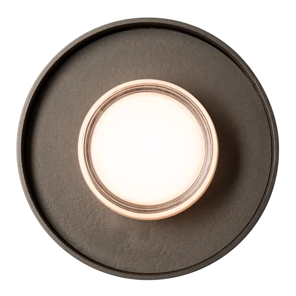 Looking for the perfect wall sconce or a semi-flush for a smaller space? This ADA compliant fixture is just over 10" in diameter and could be an ideal choice. Smaller in size, but large in style, the Focal features a unique inner ring of steel that is available with a clear (-44) finish option that puts on display the signature textures of the forge. A thick, central "milky" glass diffuses the light while a very substantial clear perimeter of glass creates a focal effect. With a selectable CCT (2700/3000/4000), you can personalize the color temperature during installation. - alternate view