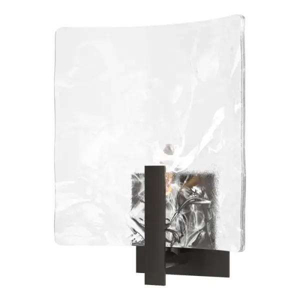 A large square thick convex glass panel that is clear with a freeform white swirl is held by a single, vertical handcrafted steel bar in the Arc 1-Light Bath Sconce.