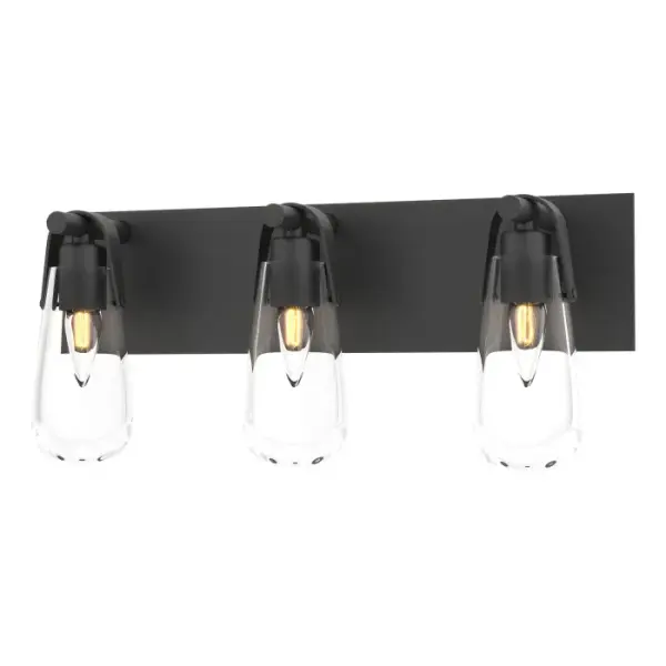 The Eos 3-Light Bath Sconce is named for its namesake glass, reminiscent of an early morning dewdrop left by Eos, the Greek goddess of dawn. Ideally suited to be placed above the mirror of single or double bath vanities. U-shaped metal bands and backplate are handcrafted by Vermont artisans