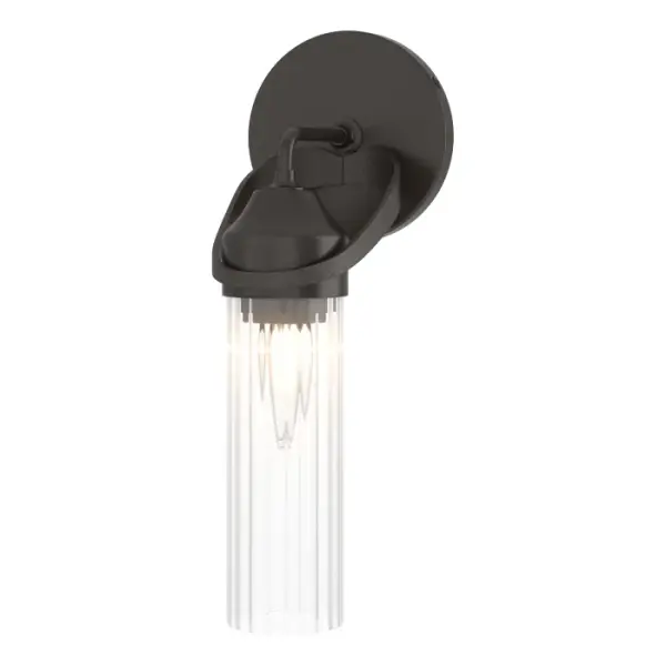 A versatile wall mount, the Bow 1-Light Bath Sconce can be positioned for up- or downlight. This wall mount features fluted, ribbed glass cylindrical shades, with a metal base embellished with a handcrafted metal collar affixed to its round backplate.
