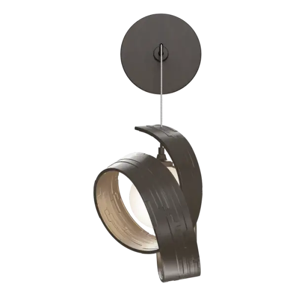 A beautiful, sculptural addition to any room. The Riza wall sconce is both delicate and statement-making. The handcrafted nature of the metal is evident. The light is nestled within a "swirl"of hammered and shaped aluminum that is held by a low voltage cable with great adjustability, enabling a large flexibility in drop-height to be customized to the space.