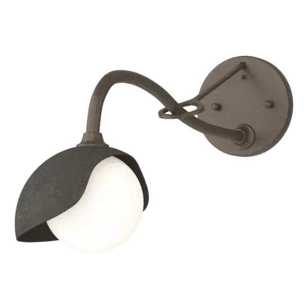The Brooklyn 1-Light Single Shade Long-Arm Sconce features an extended arm for those situations where it is needed. With an added handcrafted metal loop embellishment, the long arm is gracefully curved. The Brooklyn's shade is forged and handmade by Vermont artisans. Available in Black, Oil Rubbed Bronze, Vintage Platinum, Soft Gold, Sterling and Modern Brass.
