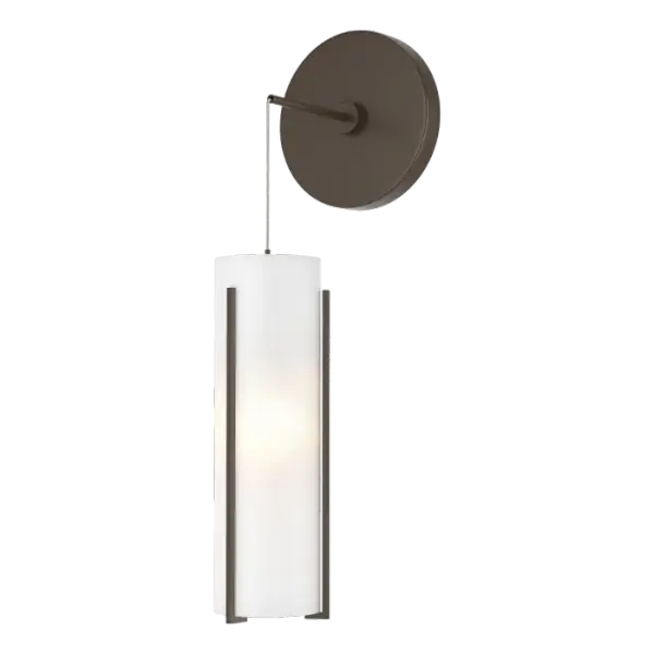 The Exos Collection pieces feature steel rods handcrafted to vertically support each shade. Glass double cylinders, with a frosted inner and a choice of clear or frosted outer glass shade offer a different feel and style for any space. You can set your own desired low voltage cable drop height for unique applications of this wall sconce, including vanity or beside, among others. - alternate view