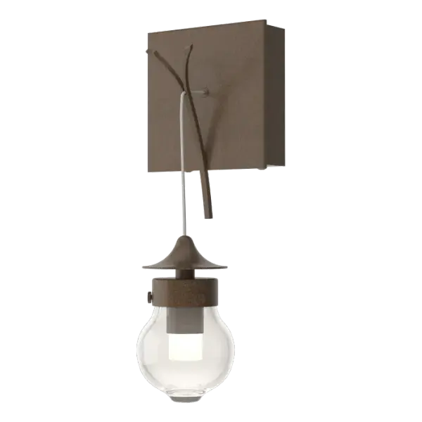 Thick hand blown glass is hung under the Kiwi's branch of steel. The glow floods the sconce's glass with a warm light highlighting its detail.