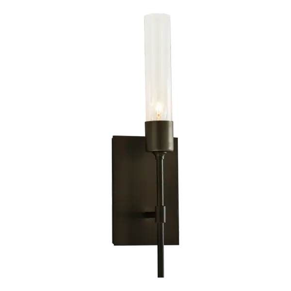 Clean and contemporary in design, the Vela Sconce focuses on the beauty of simplicity and craftsmanship. A choice of sleek clear glass or frosted glass completes this contemporary sconce.