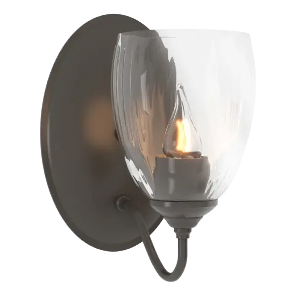 Simple. Traditional. Our Simple Lines Wall Sconce is a celebration of the past. Hubbardton Forge's design team is well-versed in classic wrought iron creations. Forged by artisans here in Vermont.