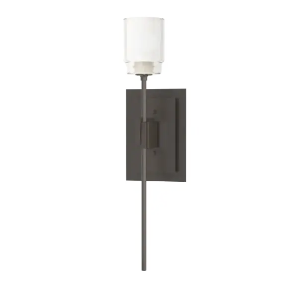 Our Echo Sconce looks like a scepter held between two hand-forged steel plates. With the slenderness of the steel tube, it may be hard to believe it's wired, but our artisans have outdone themselves crafting the illusion.