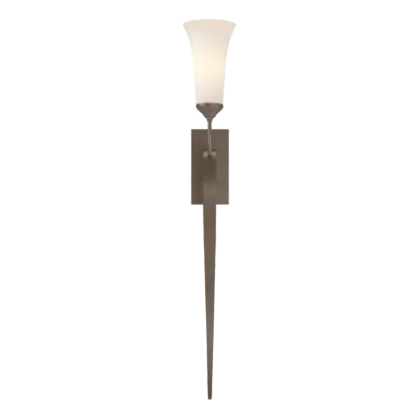 Whether you let your eye wander up to the glass or down to the tapered point of the forged and formed steel, you're in for a pleasant journey. Our Vermont metalsmiths have taken a simple wall sconce and rendered a thing of timeless beauty. Shaped in Vermont.