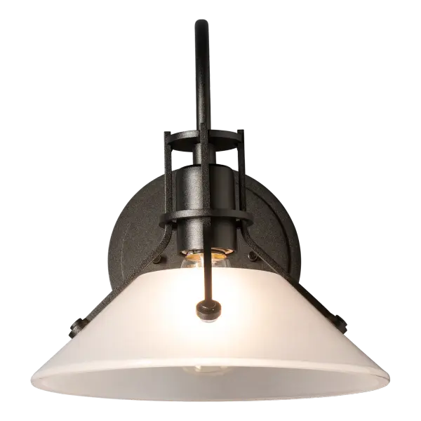With its stunning, clear, thick glass shade and elegantly curved stem, the Henry Small Sconce w/Glass Shade is a new member of iconic Henry Collection for interior settings. Bulb choices can shift the look from industrial to contemporary. Also available in a larger size.