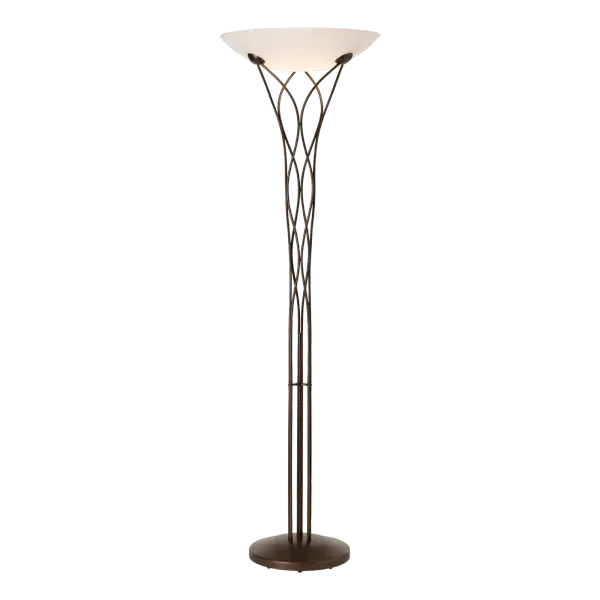 Light, airy, elegant, the Lattice Torchière is aptly named for the painstaking handwork by our Vermont artisans. The flowing steel creates lattice patterns as each crisscrosses another as it ascends vertically toward the glass they embrace.