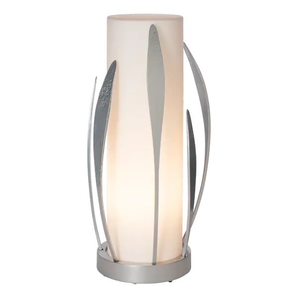 A vertical lamp with a small footprint, the Dahlia Cylindrical Table Lamp by HF designer Paul Marr Hilliard boasts a beautiful translucent frosted opal glass cylinder that shades the light within, surrounded by hand-forged "petals" made by Vermont artisans.
