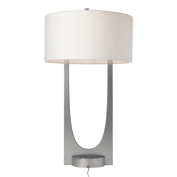 The Cypress Table Lamp was inspired by a single curved pencil sketch. This lamp embraces the interplay between dark and light through its unique design. In a nod to its namesake Cypress tree’s iconic bark, the lamp’s rough-textured inner edges reflect the light, and contrast beautifully with the sleekness of its U-shaped body. Two-tone look available, with the base in the same or a contrasting accent finish.