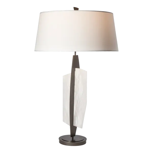 Natural alabaster stone is the focal point of the striking Volterra Table Lamp designed by Paul Marr Hilliard. The lustrous quality of the translucent white stone brings an elegance to the room. This tactile element intersects the strong steel body of this stunning shaded lamp.