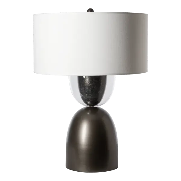 The Union Table Lamp demands attention in any space. A large lamp with a gently shaped steel lower and an upper half of forged steel encased in clear glass, this is a union of two opposing halves. The finial mimics their shape, adding to the details that make this lamp so special. A large, round fabric shade completes the aesthetic. - alternate view