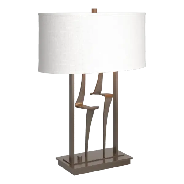 Don't be surprised if you find yourself turning on our Antasia Table Lamp just to get a better look at the artistry used to create it - it's that good. Hand-forged here in Vermont, our Antasia takes flowing steel forms, bookended between straight bars to create a visual treat like no other.