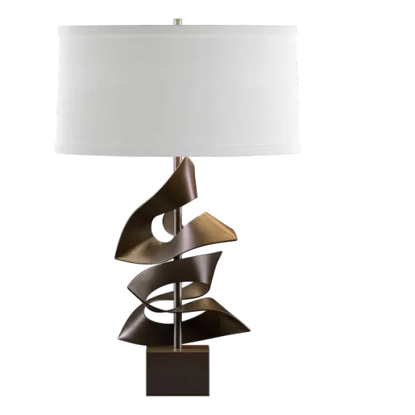 A work of art in its own right, our Gallery Table Lamp is accented with two sheets of steel that have been cut, heated in our forge and worked into shape. Crafted by our metal virtuosos here in Vermont, each piece is unique.