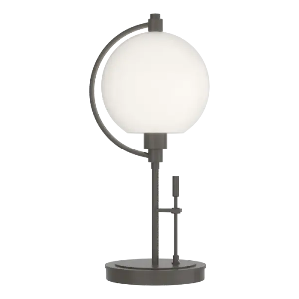 Back in 2006, Pluto was demoted from a planet to a dwarf planet. Our design team disagreed with that decision and our Pluto Table Lamp, with its glass orb, is the physical representation of their support of the "ninth planet." Crafted by our Vermont artisans.