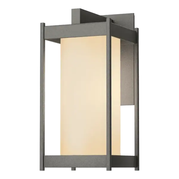 The Cela Medium Outdoor Sconce is a modern interpretation of a traditional outdoor wall lantern that is perfect for any outdoor space. Made of aluminum and glass, the design is sleek and minimalistic, with a touch of elegance. It's the perfect addition to your outdoor space!