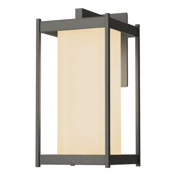 The Cela Large Outdoor Sconce is a striking piece of contemporary outdoor lighting that suits many architectural styles. Strong rectilinear lines of the aluminum frame hold a well-proportioned cylinder of blown glass. Sleek and minimalistic, the Cela wall-mounted sconce is offered in any of our six Coastal Outdoor Finishes.