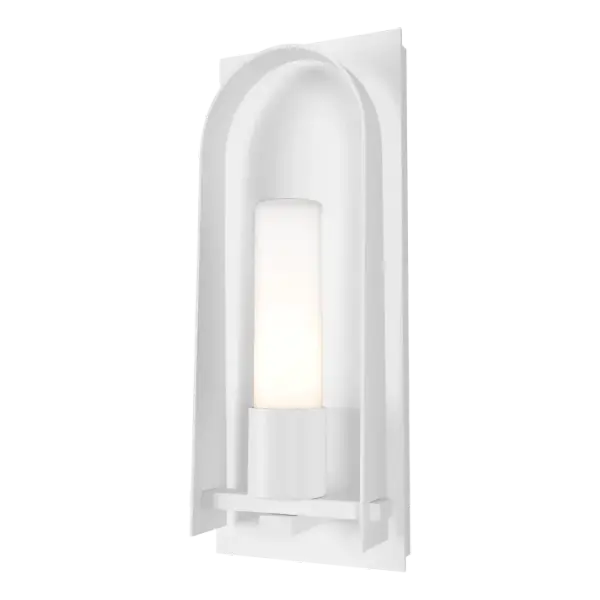 The Triomphe Small Outdoor Sconce is 16” in height and features this collection’s trademark handcrafted classical arch with craftsman tenon details on an aluminum backplate, as designed by David Martin. Available with clear seeded or opal glass cylindrical shade and a selection of robust AAMA-rated Coastal Outdoor Finishes.