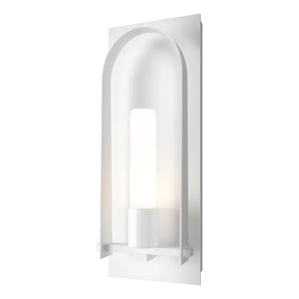 The Triomphe Medium Outdoor Sconce features a “classically arched shape and details that reference craftsman tenons” according to Designer David Martin. At 2-ft in height, the Triomphe’s elegant clear seeded or opal cylinder glass shade is accented with a graceful, handcrafted arch on an aluminum backplate, and any of our robust AAMA-rated Coastal Outdoor Finishes.