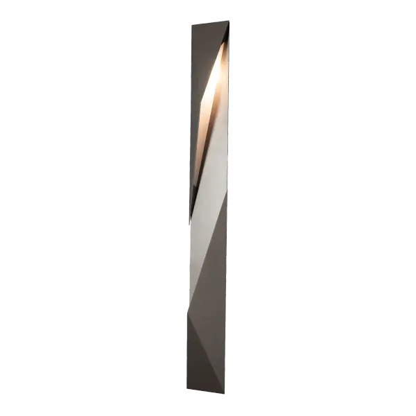 It's all that! The dramatic play of light and shadow in the 3-dimensional diagonals of this Carbon design is truly remarkable. According to Ori Goldberg, "It's a minimalistic design that complements a variety of architectural styles." Difficult to put into words the stunning effect of this large wall mount exterior sconce—clean, contemporary, and geometric. Made for the outdoors, yet beautiful indoors, as well, this fixture is offered in a choice of AAMA 2604-rated Coastal Outdoor Finishes. - alternate view