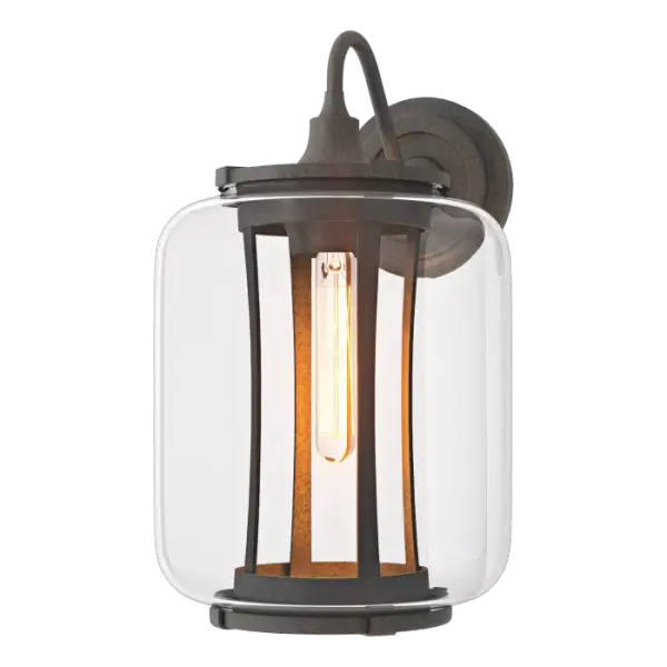 The Fairwinds Large Outdoor Sconce features an inner, handcrafted aluminium skeleton that is visible through its substantial, clear glass shade. Available in a choice of robust Coastal Outdoor Finishes.